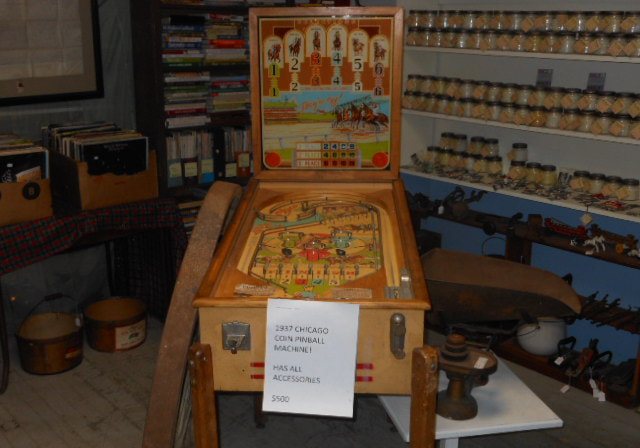 Vintage arcade and gumball machines on the shop floor